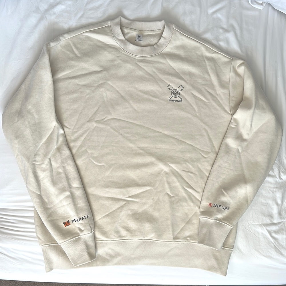 80% cotton 20% polyester. Never worn. Never washed. Super soft on the inside.